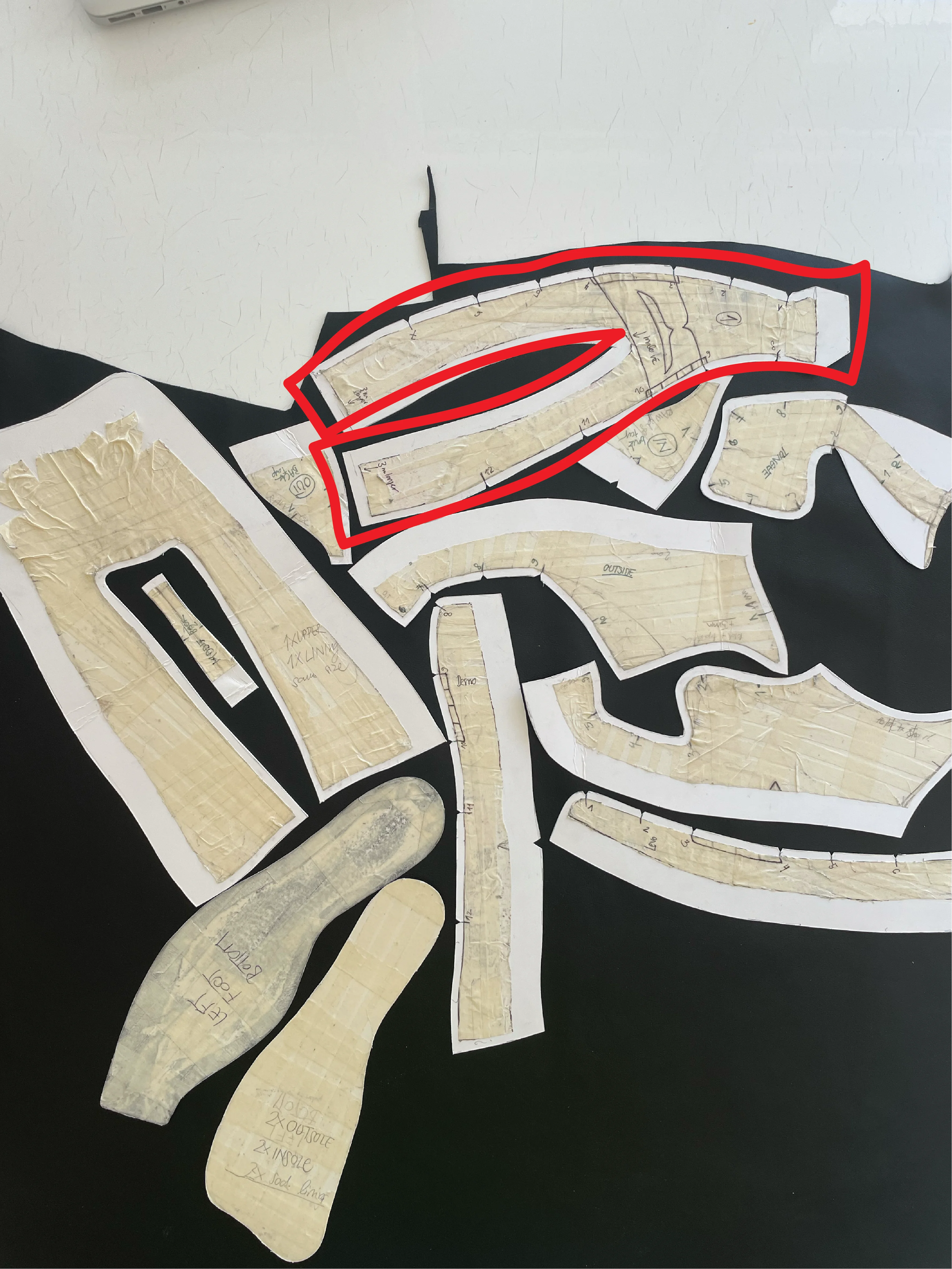 Footwear pattern pieces arranged during the design process
