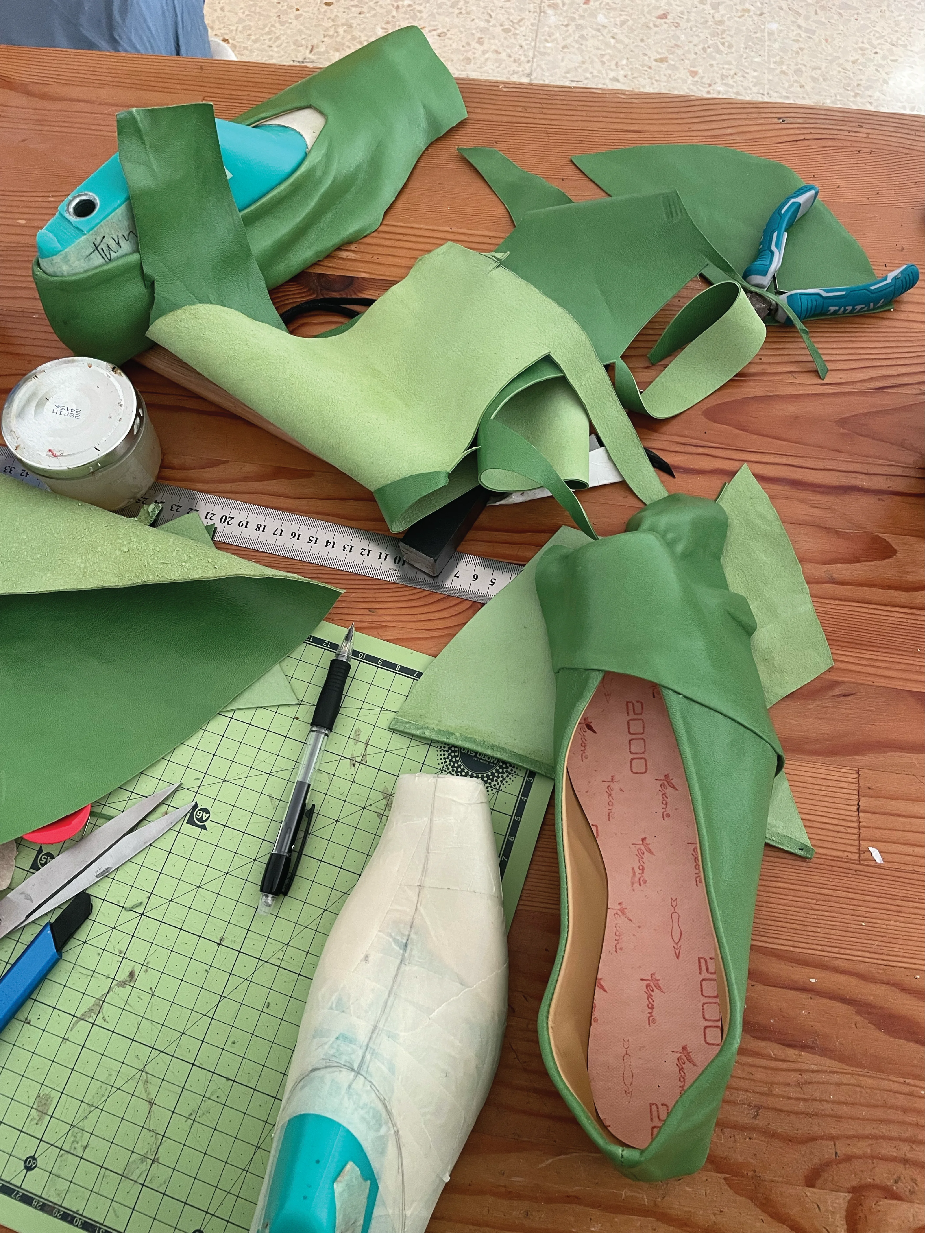 Green footwear pattern pieces and materials